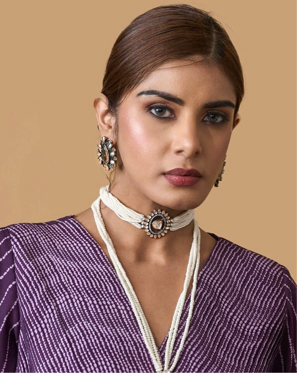 Timeless Multi-Strand Pearl Choker with Central Gemstone Pendant