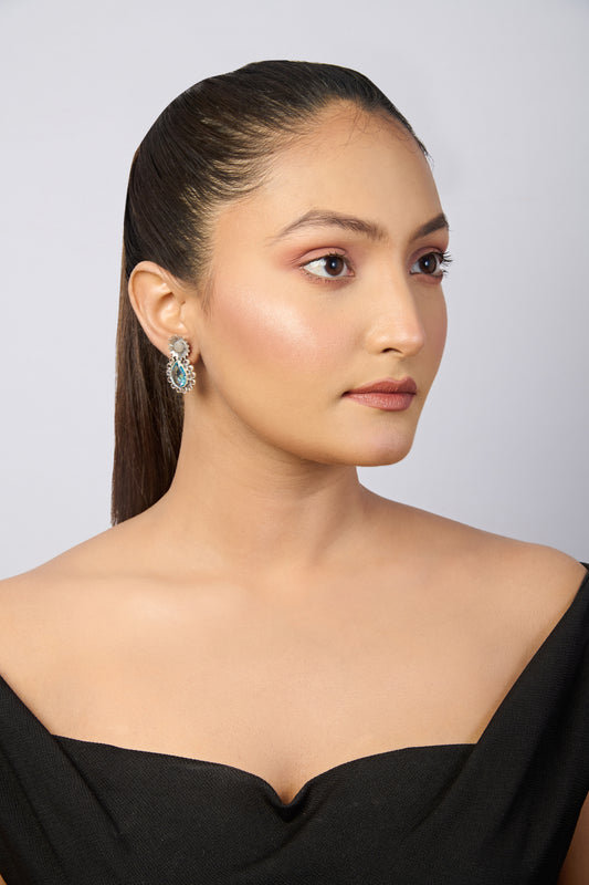 Oxidized Silver Dangle Earrings with Pear Blue Topaz, Moonstone Accents, and Floral Top