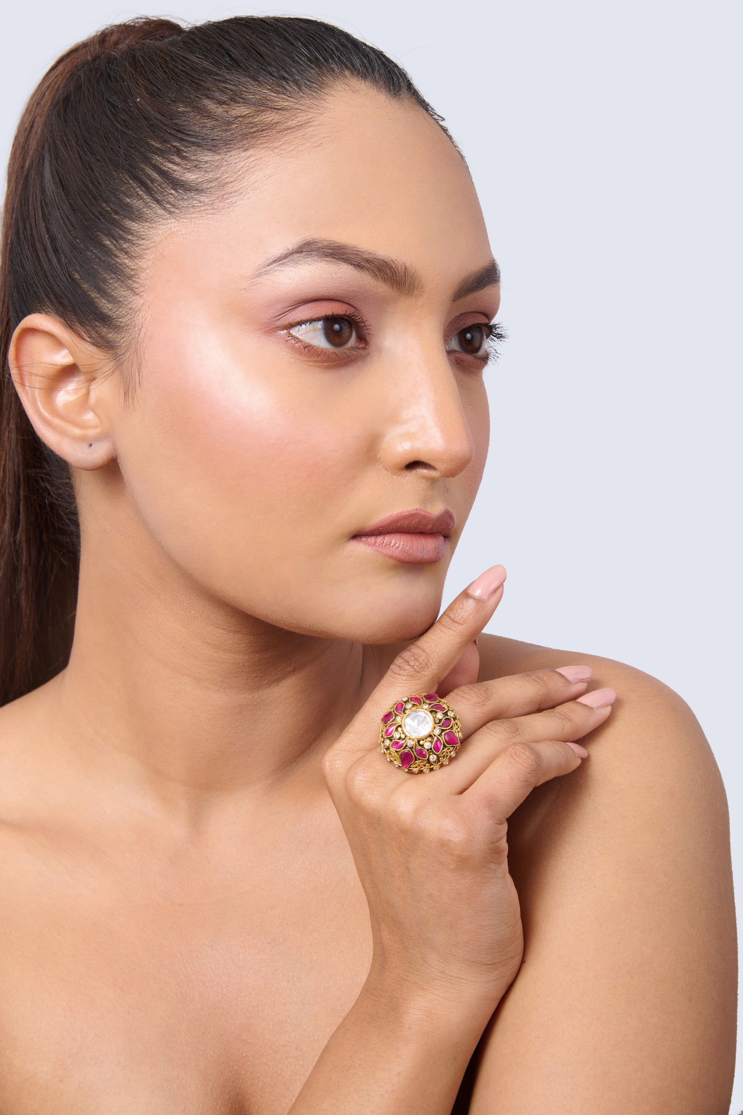 Gold-Toned Adjustable Ring with Central White CZ, Pink Ruby Accents, and Clear CZ Details