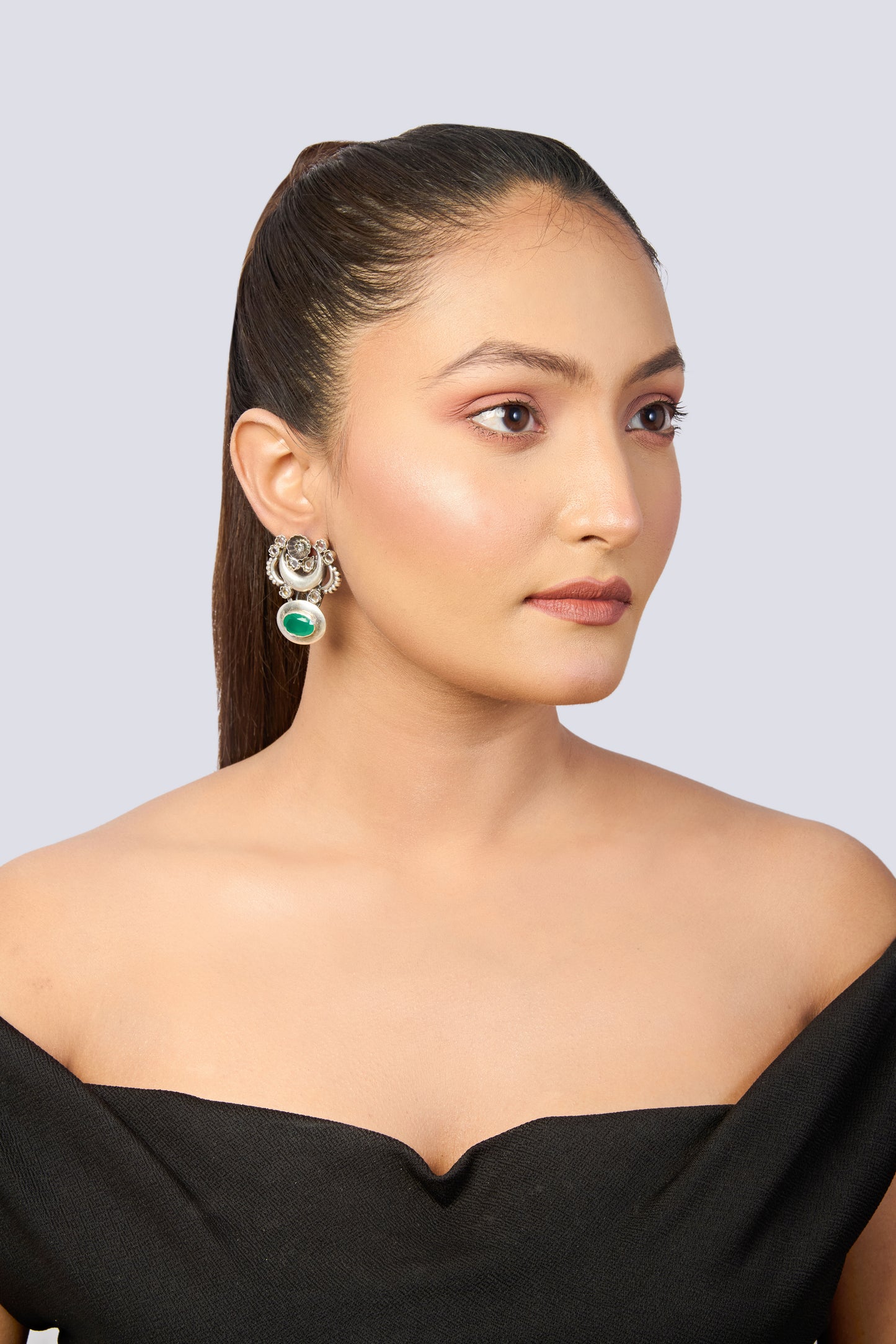 Women's Ethnic Silver Earrings with Moon Design, Floral Accents, and Green Stone Drop