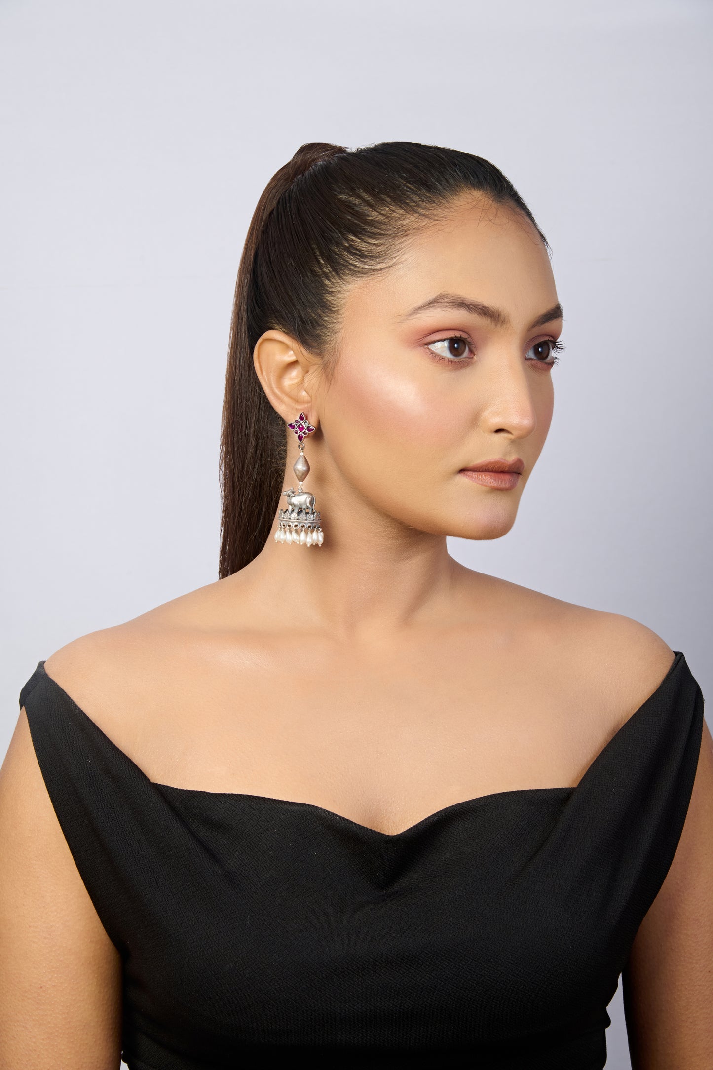 Oxidized Silver Jhumka Earrings with Star Top, Cow/Nandi Figures, and Dangling Pearls