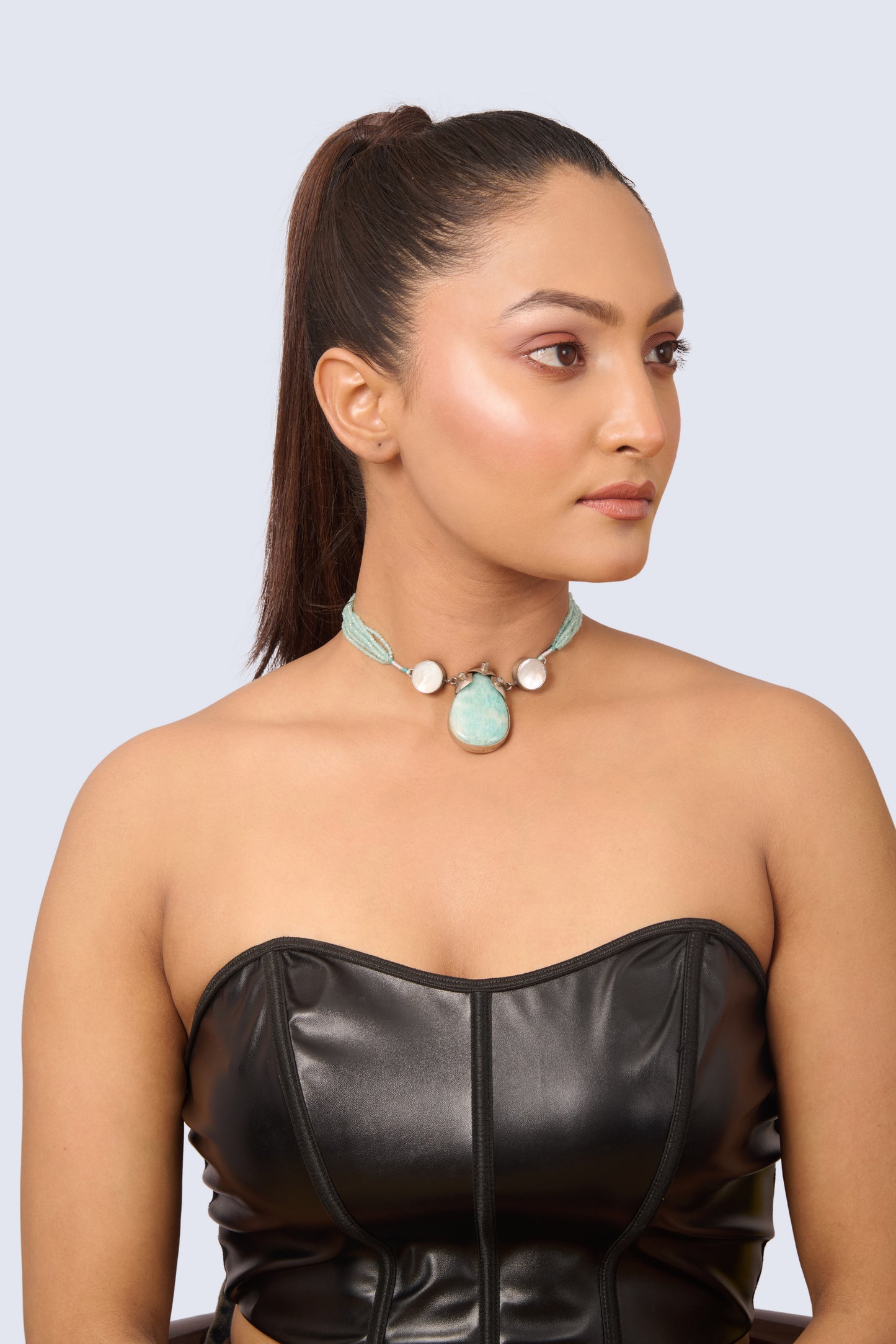 Silver Tone Necklace with Teardrop Amazonite Pendant, Carved Blue-Green Elements, and Moonstones