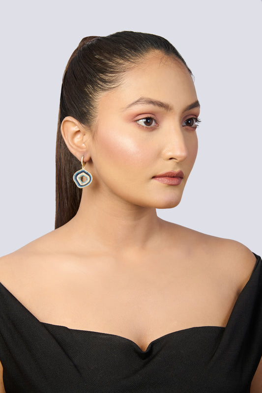 Gold-Toned Hoop Earrings with Abstract Blue, White, and Black Evil Eye Dangles