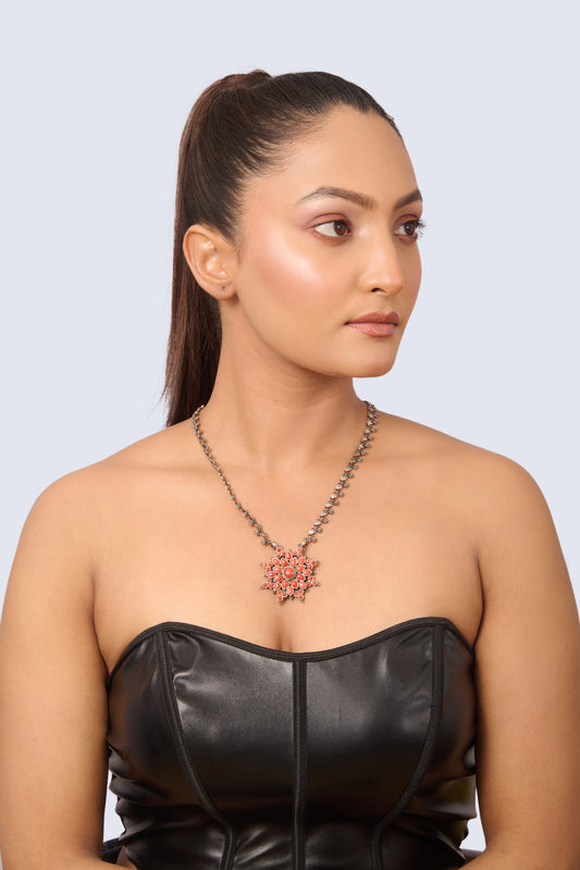 Striking Silver Necklace with Orange-Red Gemstone Flower
