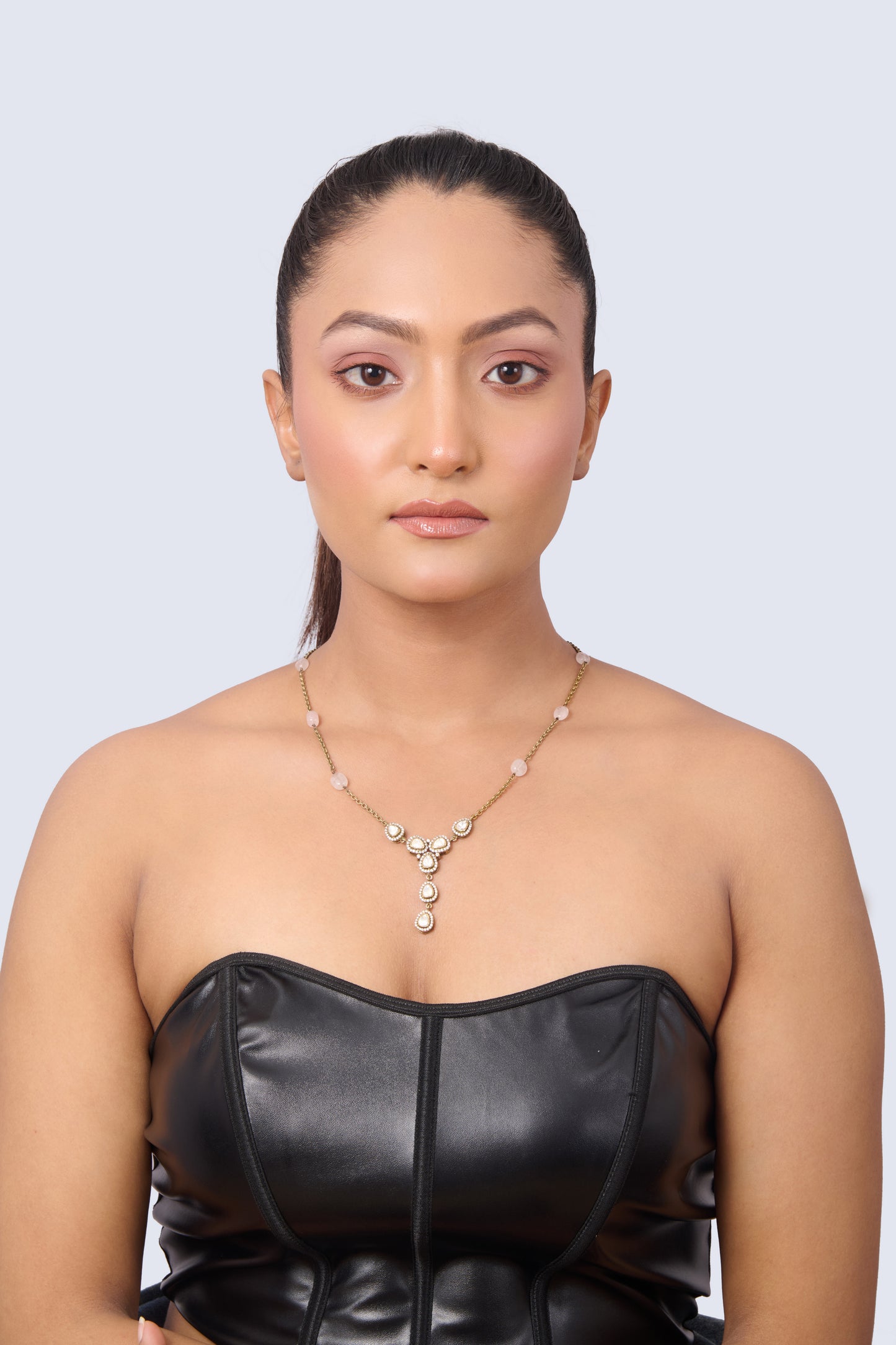 Gold Tone Necklace with Pink Pearls and Pear-Shaped White CZ Accents