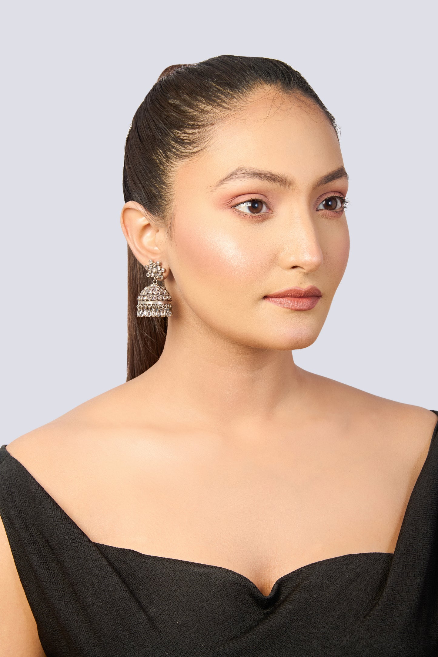 Oxidized Silver Stone Studded Jhumka Earrings with Floral Top