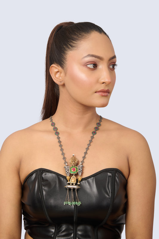 Silver Tone Necklace with Ruby Accented Chain, Emerald Center, Gold Lion, and Jade Drops