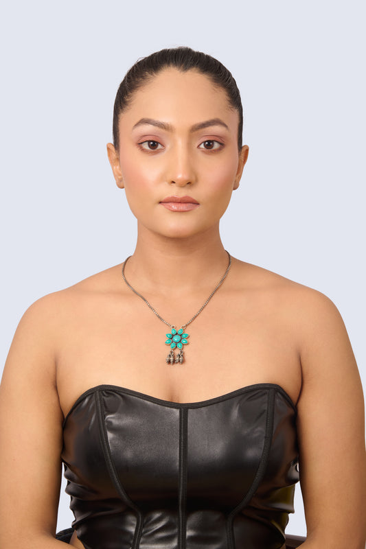 Silver Tone Necklace with Turquoise Flower Pendant and Dangling Silver Bells