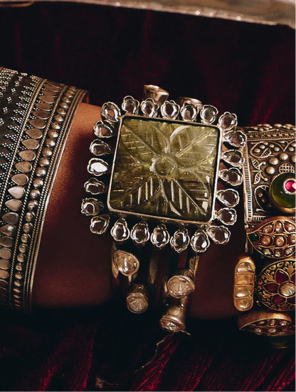 Dual-Tone Twisted Cuff Bracelet with Sapphire & Carved Gold Charm