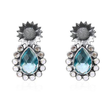 Oxidized Silver Dangle Earrings with Pear Blue Topaz, Moonstone Accents, and Floral Top