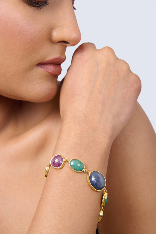 Gold-Toned Bracelet with Oval-Cut Sapphire, Ruby, Emerald, and Yellow Sapphire