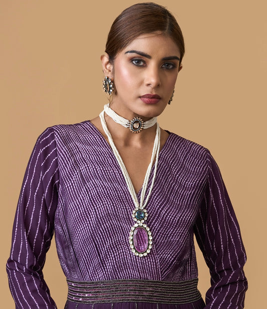 Timeless Multi-Strand Pearl Choker with Central Gemstone Pendant