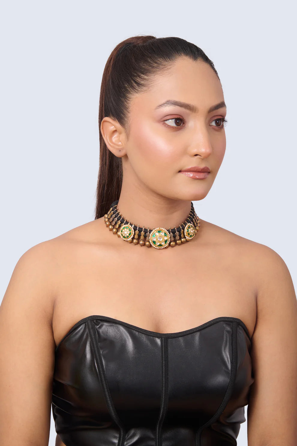 Intricate Necklace with Emerald Center, CZ Details, and Gold Bead Dangles