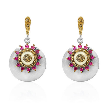 Dual-Tone Ruby Stud Earrings with Intricate Design