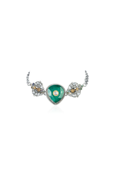 Silver Tone Necklace with Heart-Shaped Emerald, Gold Accent, and Floral Gem Details