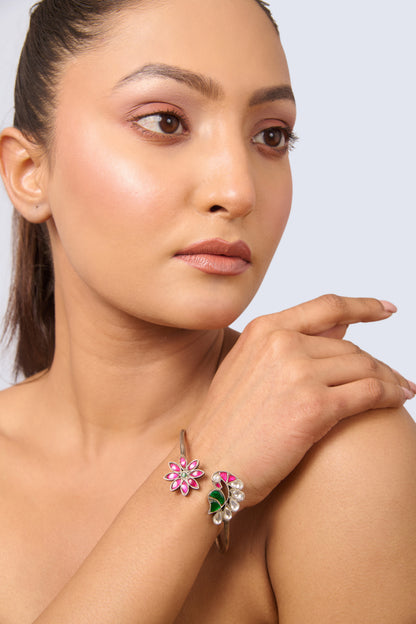 Unique Silver Tone Bangle with Ruby, Emerald, and White Gem Details